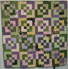    Ribbon Winner 05 B 14 Marty Frolli - Kiku - 1st Place: Large Traditional Pieced Self Quilted